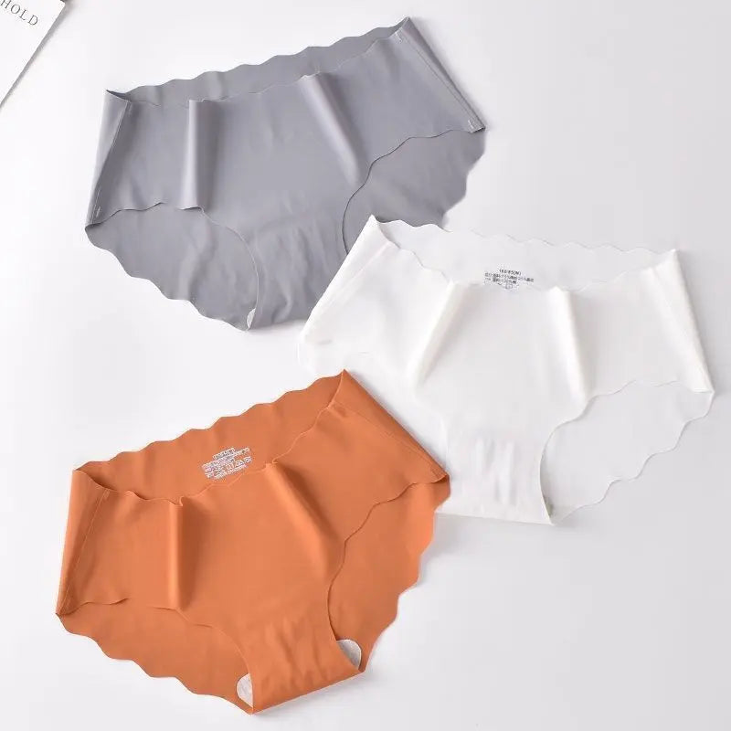 Ice silk seamless wavy edge one-piece non-indentation polyester solid color women's underwear double-layer crotch mid-waist briefs Alice Thong