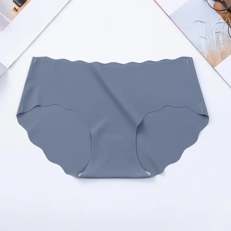 Ice silk seamless wavy edge one-piece non-indentation polyester solid color women's underwear double-layer crotch mid-waist briefs Alice Thong